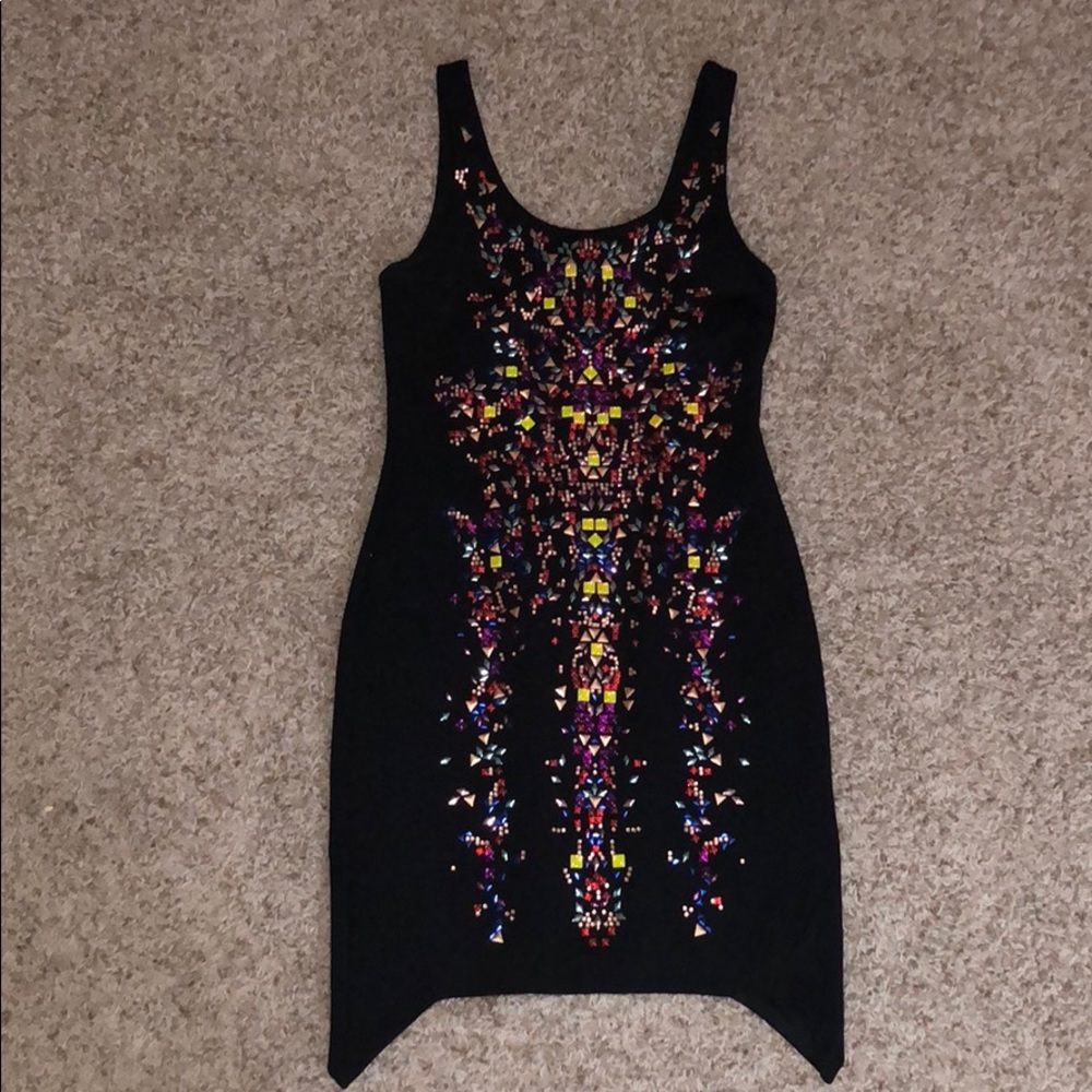 Tight black dress with gems